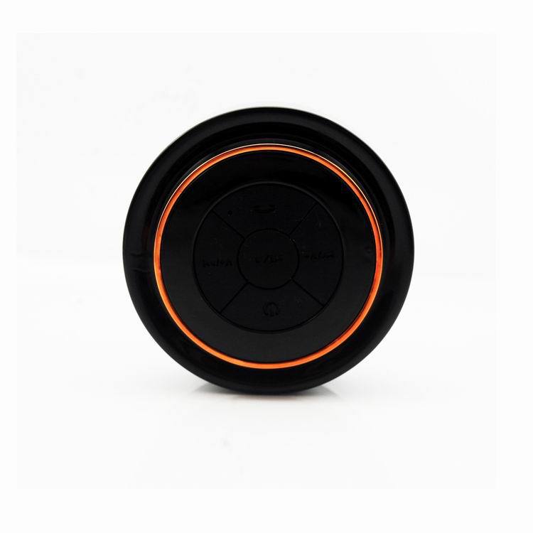 Waterproof Bluetooth Speaker with illuminated control buttons and compact design, ideal for portable use.