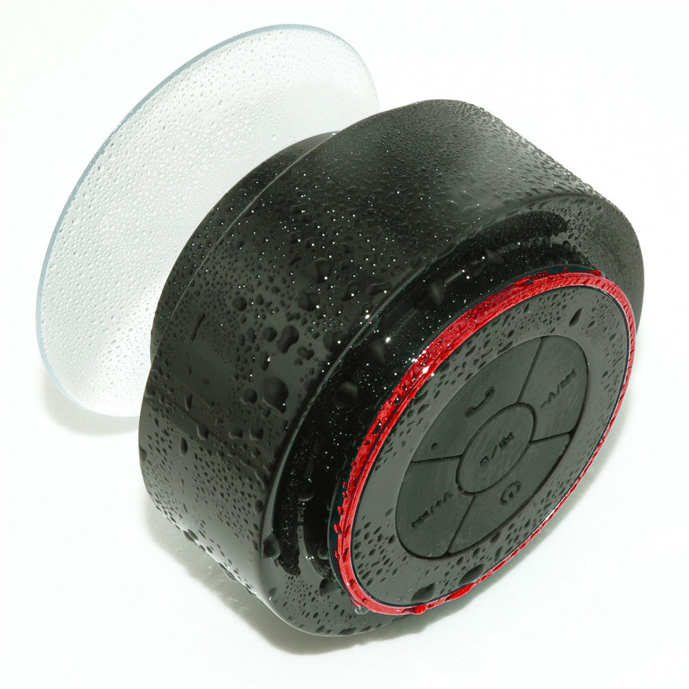 Waterproof Bluetooth Speaker with droplets, perfect for bathroom use and portable sound.
